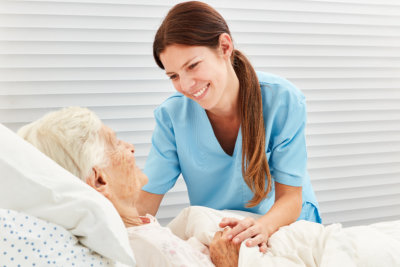 nurse cares for senior woman