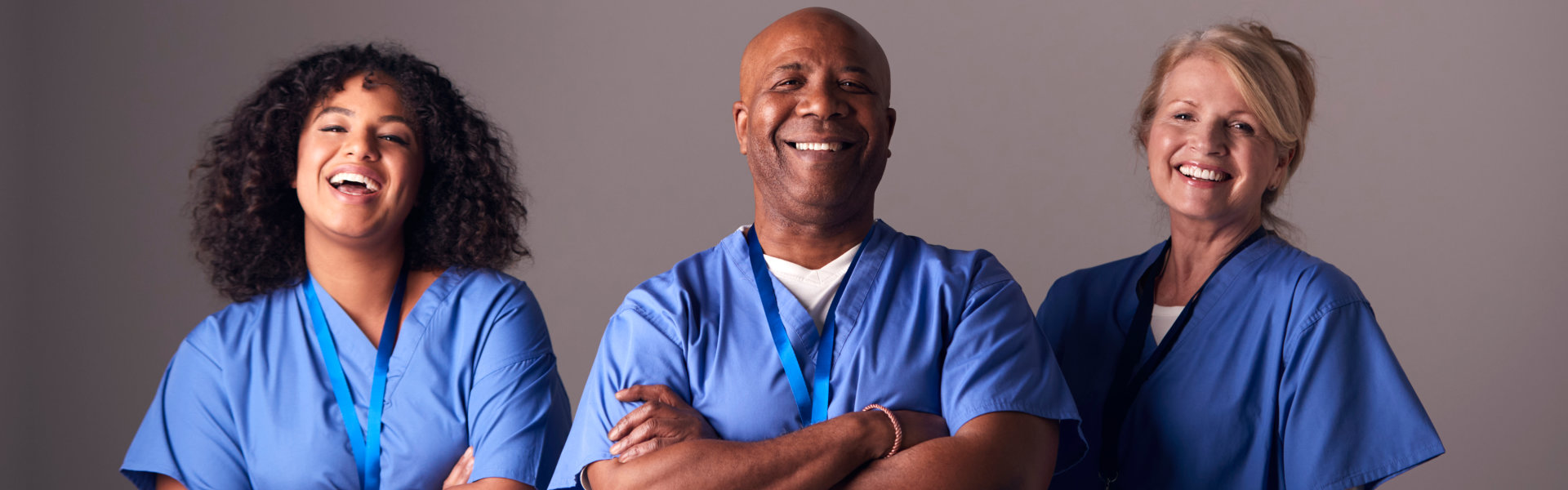 three nurses and smiling