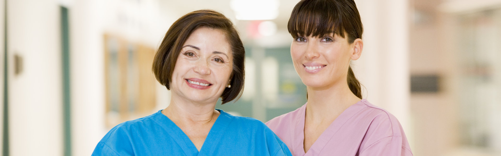 two nurse smiling